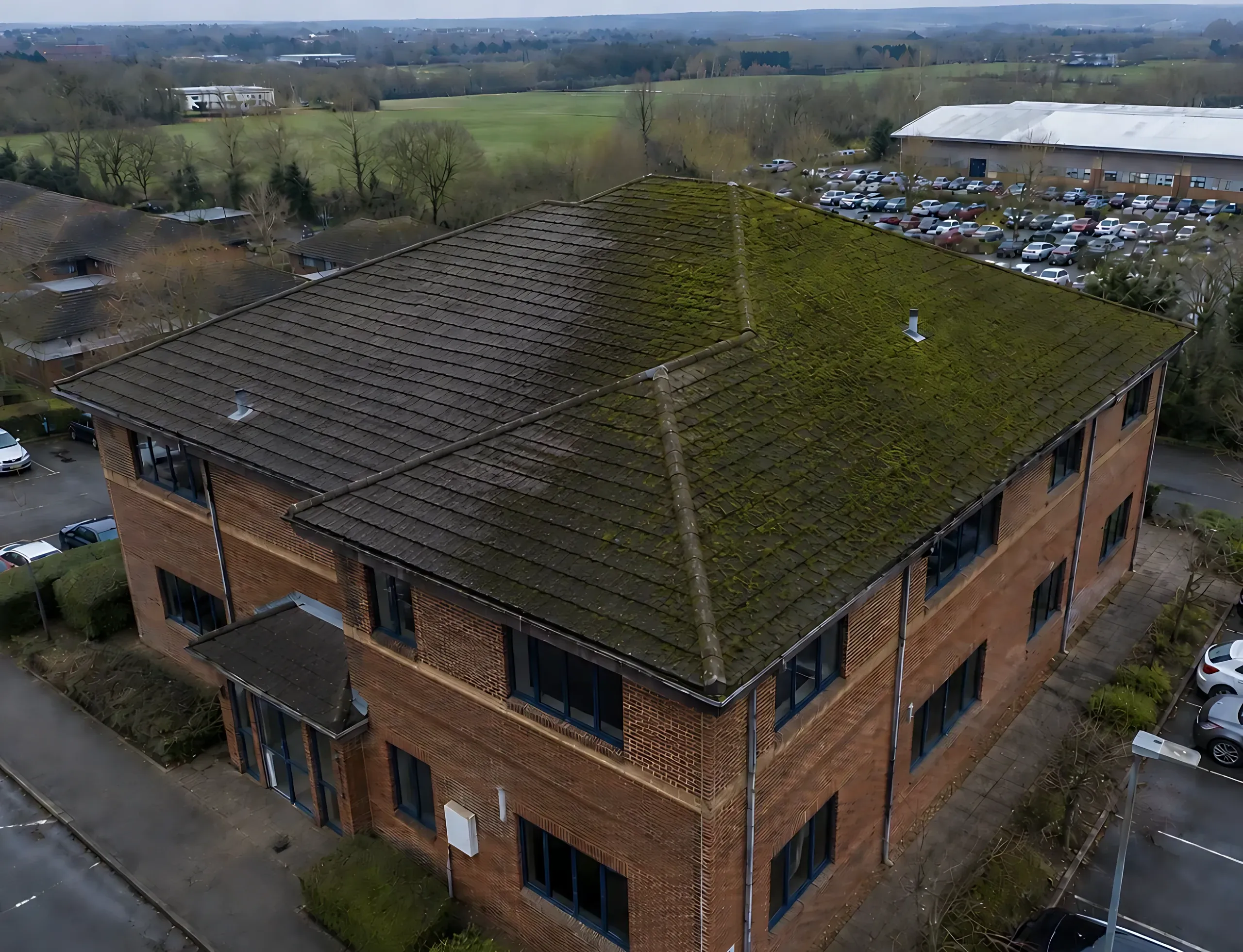 Roofs from the air across Surrey and Sussex