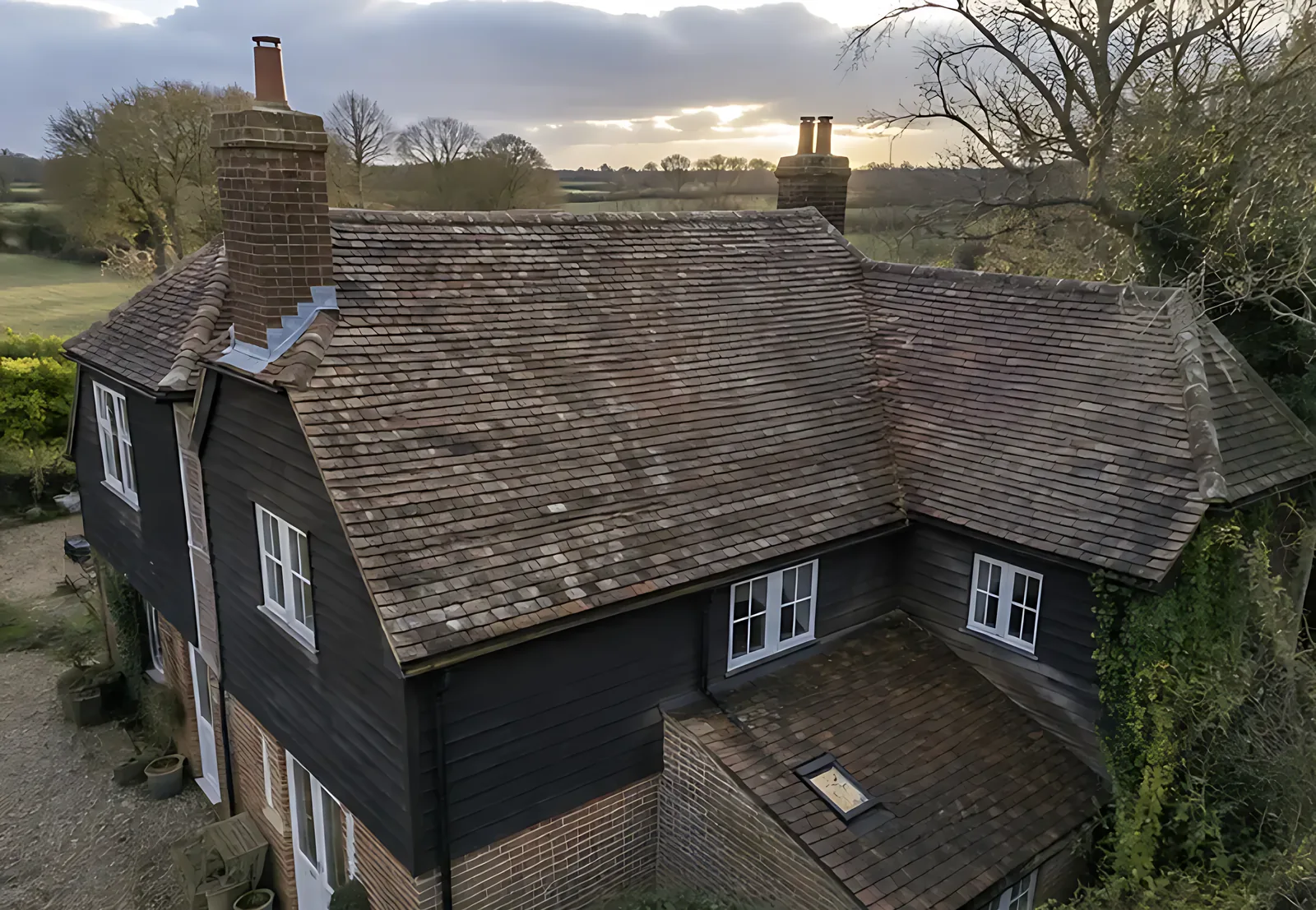 Period farmhouse roof after cleaning